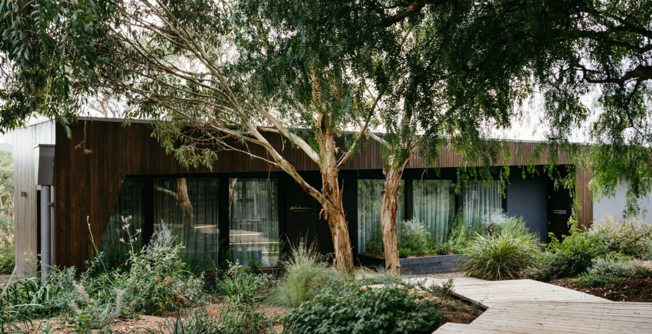 Wickens at Royal Mail Hotel entrance showing steps and door to the restaurant set in a native garden